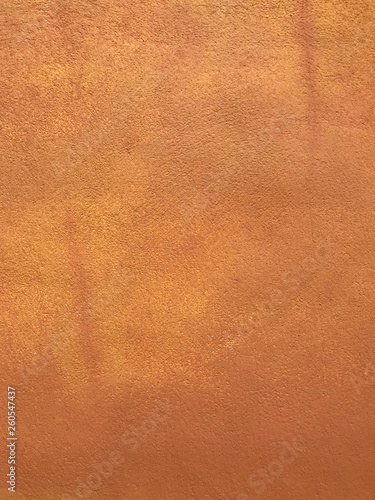 Orange cement wall background texture