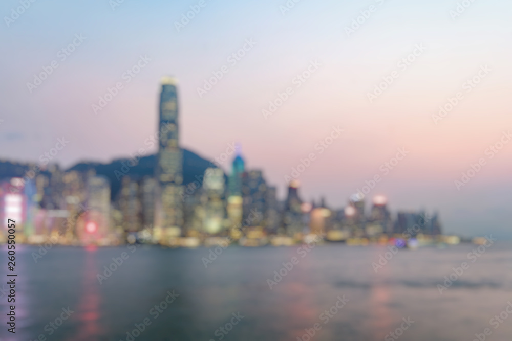Fototapeta premium Out of fucus of Hong Kong skyline on the evening seen from Kowloon, Hong Kong, China.