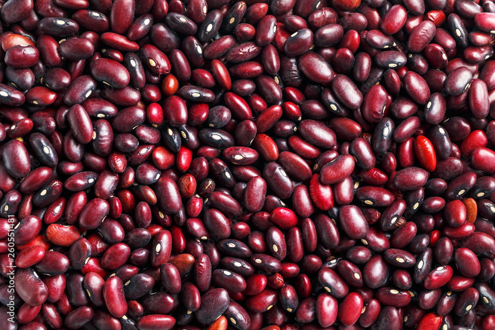 Closeup of a grain of red bean seeds. The texture of the legumes. Close up red beans background, seeds of red beans Closeup of a grain of red bean seeds. The texture of the legumes. Close up red beans background, seeds of red beans
