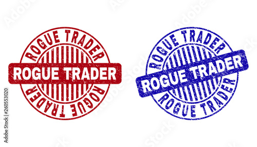 Grunge ROGUE TRADER round stamp seals isolated on a white background. Round seals with grunge texture in red and blue colors.