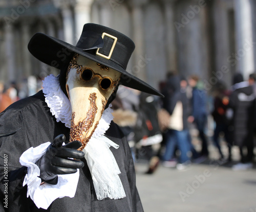 Venetian mask called Plague doctor with black hat