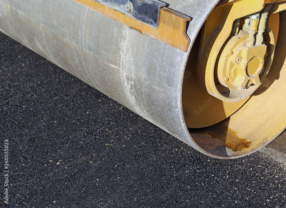 road roller and the asphalt of the new street