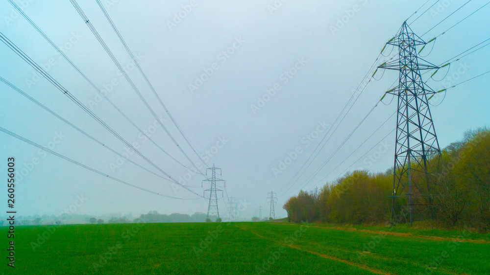 Electric Lines and Pylons on third going into the distance Electric Lines and Pylons on third going into the distance