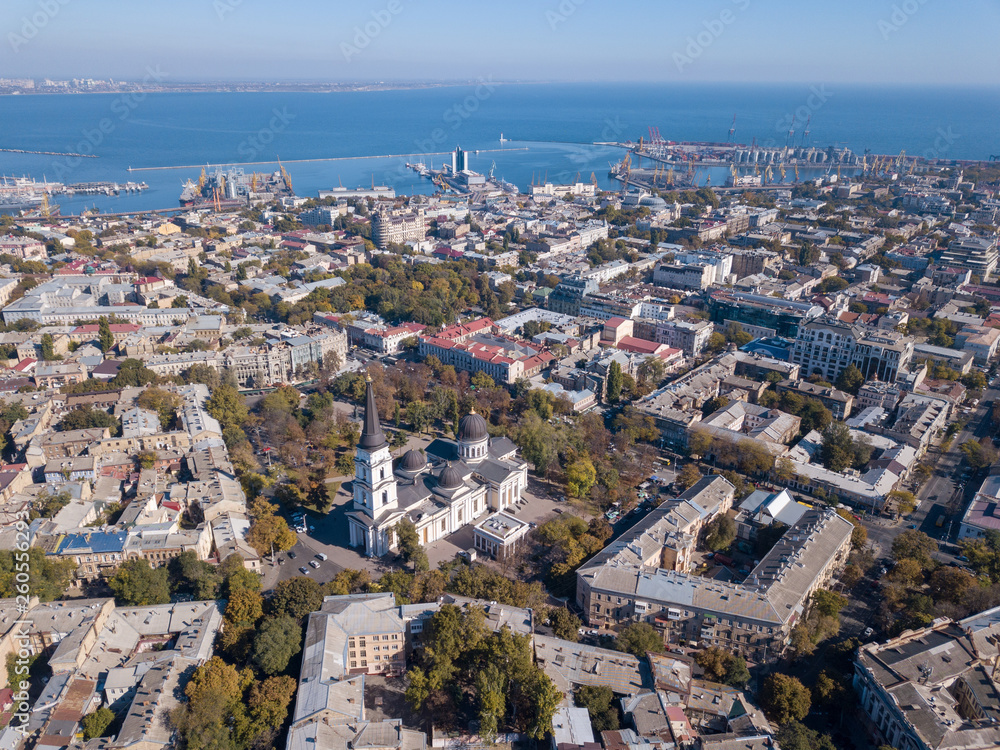 Panoramic view of the Black Sea with the port and the city from Spaso-Preobrazhensky. Cathedral against the blue sky. Ukraine, Odessa. Aerial view from the drone