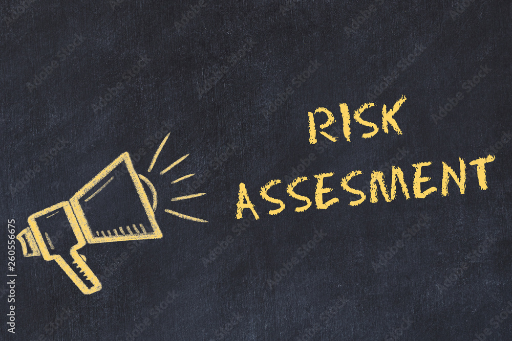 Chalk board sketch with handwritten text risk assesment Stock
