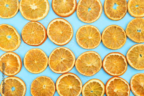 Dried orange fruits on blue background