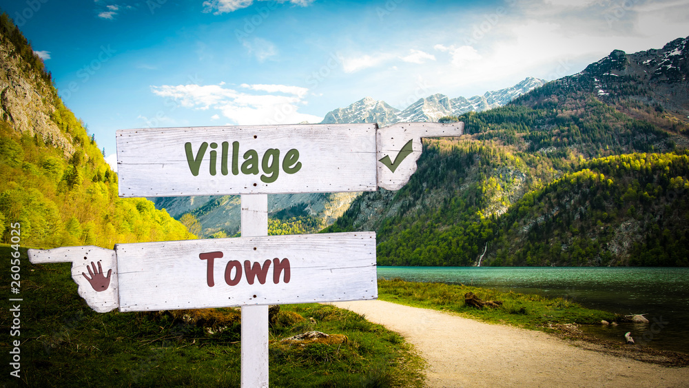 Street Sign Village versus Town