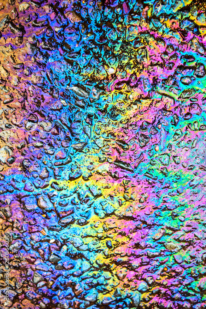 Oil Petrol Pollution Rainbow Spill on A Road Oil Petrol Pollution Rainbow Spill on A Road