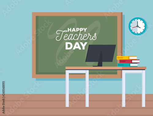 blackboard with computer to teacher day celebration