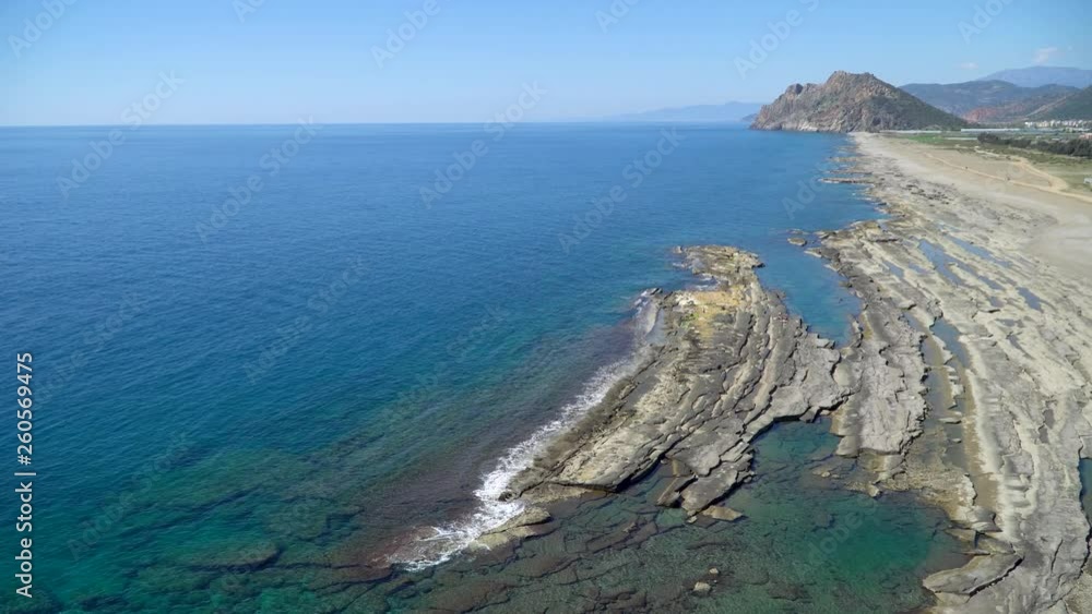 Antalya, Turkey - March 2019: Natural rock formations at Koru beach by the mediterranean sea, Gazipasa, Antalya province in Turkey Antalya, Turkey - March 2019: Natural rock formations at Koru beach by the mediterranean sea, Gazipasa, Antalya province in Turkey