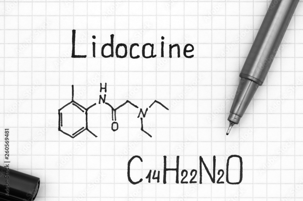 Chemical formula of Lidocaine with black pen. Chemical formula of Lidocaine with black pen.