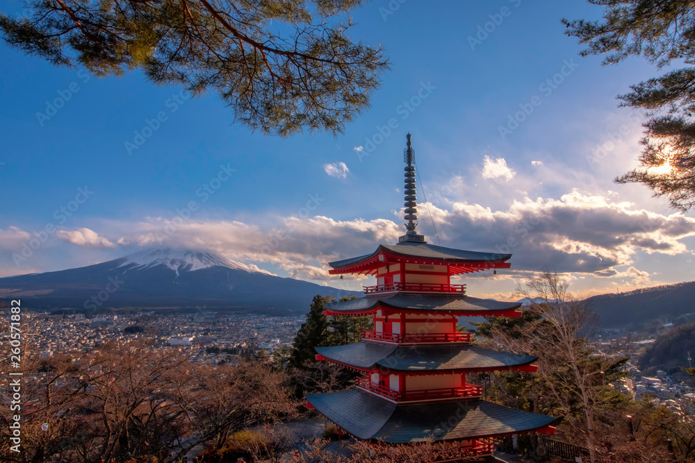 Japan view of Mt Fuji and chureito pagoda in spring season with cherry blossoms concept for fujisan japanese nature landmark, snow on top mountain scenery view, Japan landscape day time in blue sky 