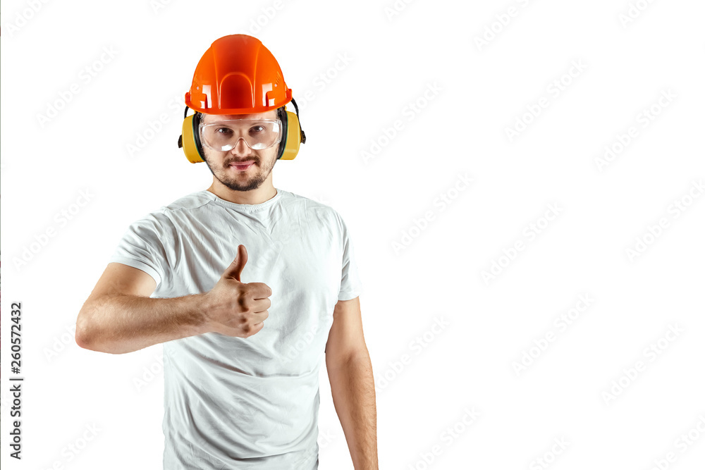 Male builder in orange helmet shows thumb up isolated on white background. Concept building, contractor. Male builder in orange helmet shows thumb up isolated on white background. Concept building, contractor.