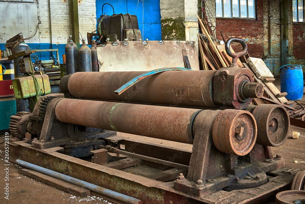 old rusty dirty machines and mechanisms in an abandoned factory