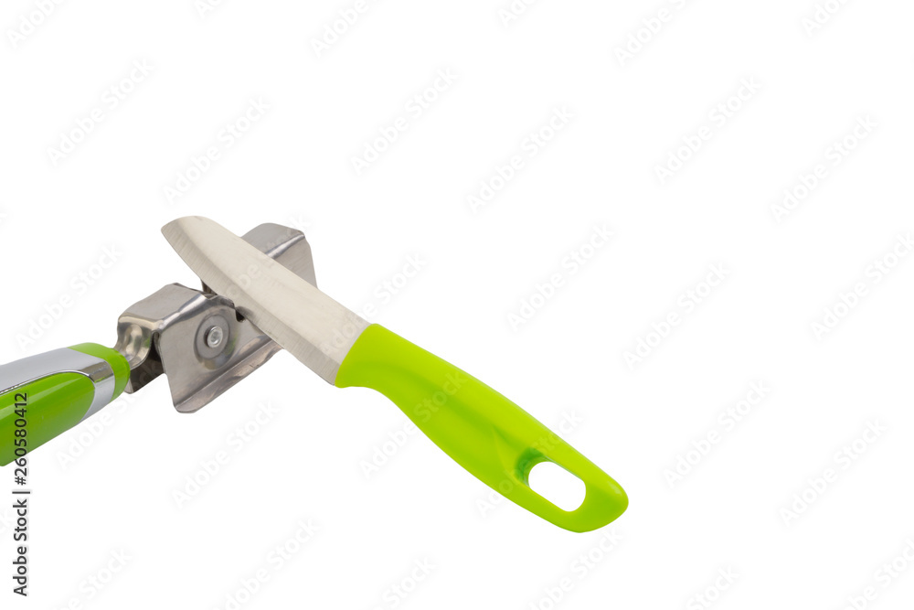 Knife, kitchen tools and knife sharpener isolated on white background. Selective focus and crop fragment Knife, kitchen tools and knife sharpener isolated on white background. Selective focus and crop fragment