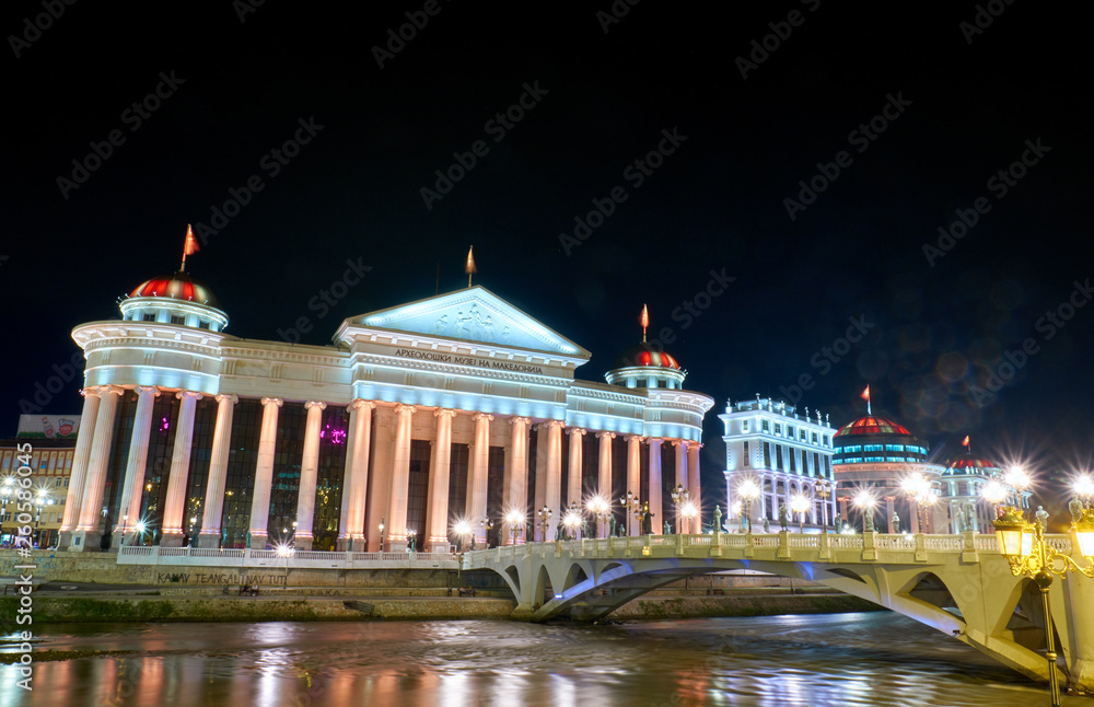 SKOPJE, MACEDONIA -AUGUST 7 2018: Modern city center with many statues at night