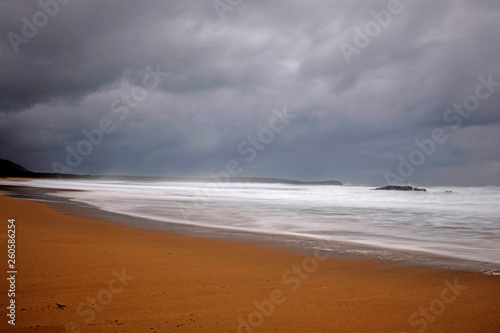 perspective of the shore of the beach