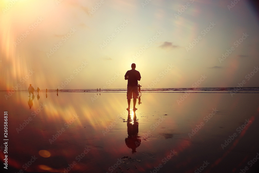 Fototapeta premium man on the beach in india, ocean, coast, vacation. rest on goa