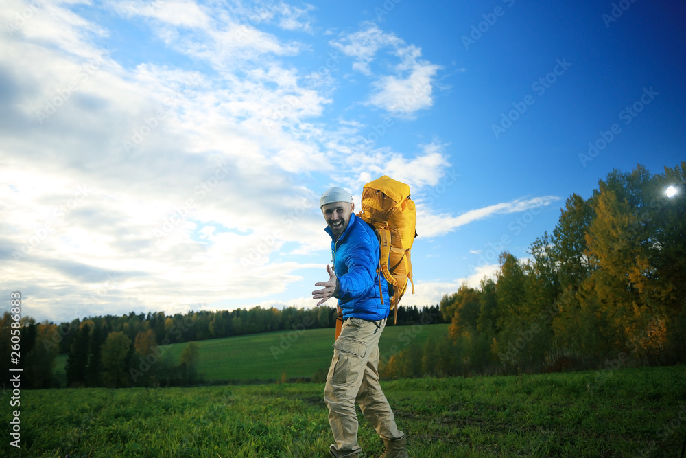 man with backpack, tourist, brutal journey, hike, the concept of active male recreation, portrait of a severe, brutal man, guy preparing equipment for the mountains man with backpack, tourist, brutal journey, hike, the concept of active male recreation, portrait of a severe, brutal man, guy preparing equipment for the mountains