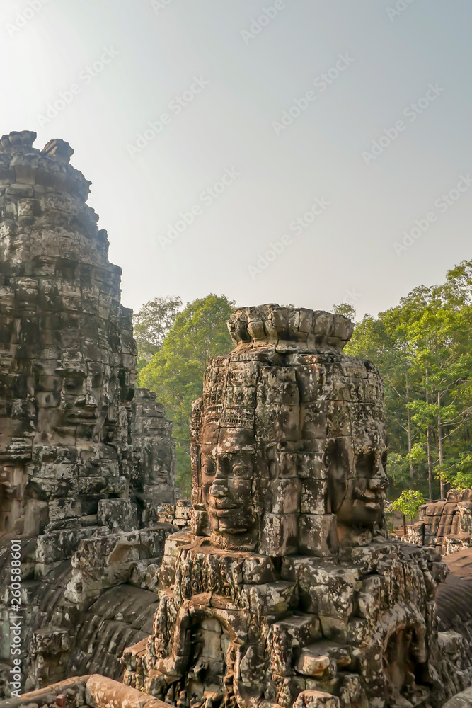 Close up of stone faces at Bayon Temple in Angkor Tom, Siem Reap, Cambodia