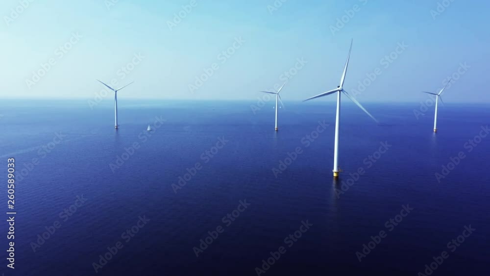 WindTurbines in a blue sea on a sunny day 
