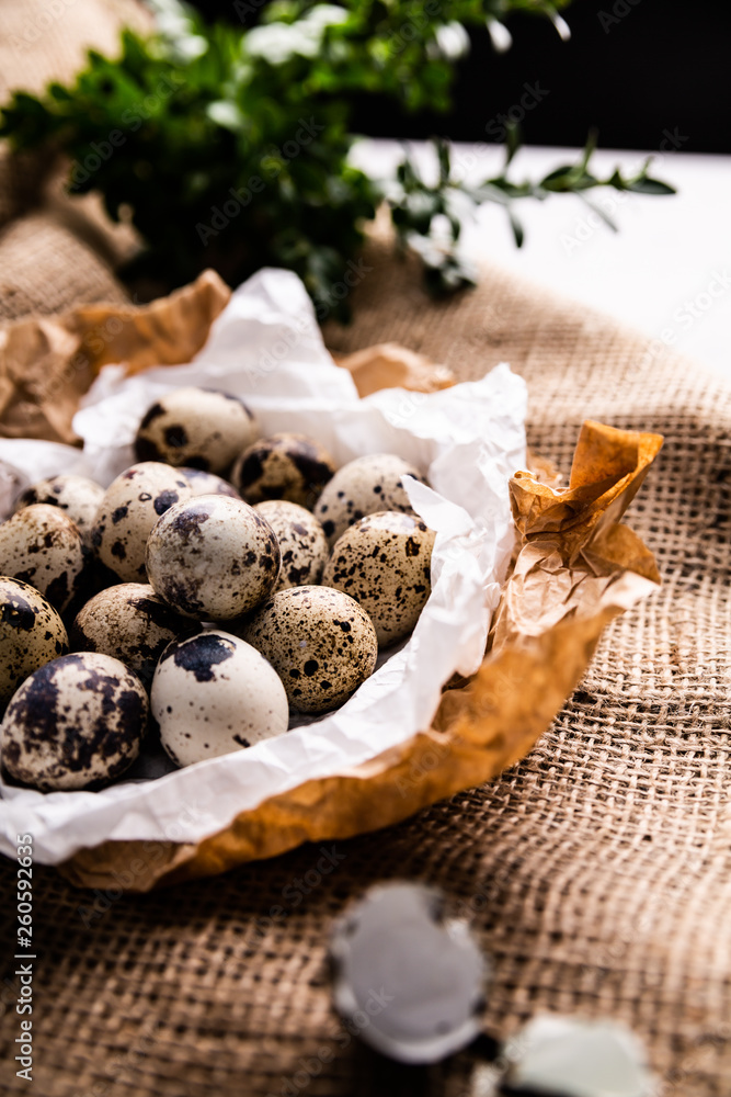 Easter, natural quail eggs in a festive basket. Easter, natural quail eggs in a festive basket.