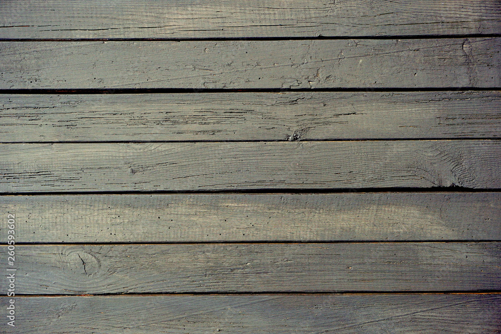 Obraz premium the horizontal old panel is painted in dark color, the background texture