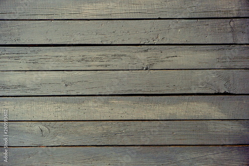 the horizontal old panel is painted in dark color, the background texture