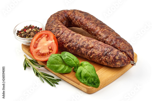 Smoked salami sausage, dried meat, close-up, isolated on white background