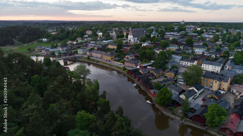 Beautiful city landscape with idyllic river and old buildings at summer evening in Porvoo, Finland