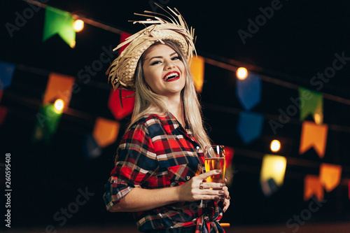Photography Brazilian woman wearing typical clothes for the Festa Junina - June festival