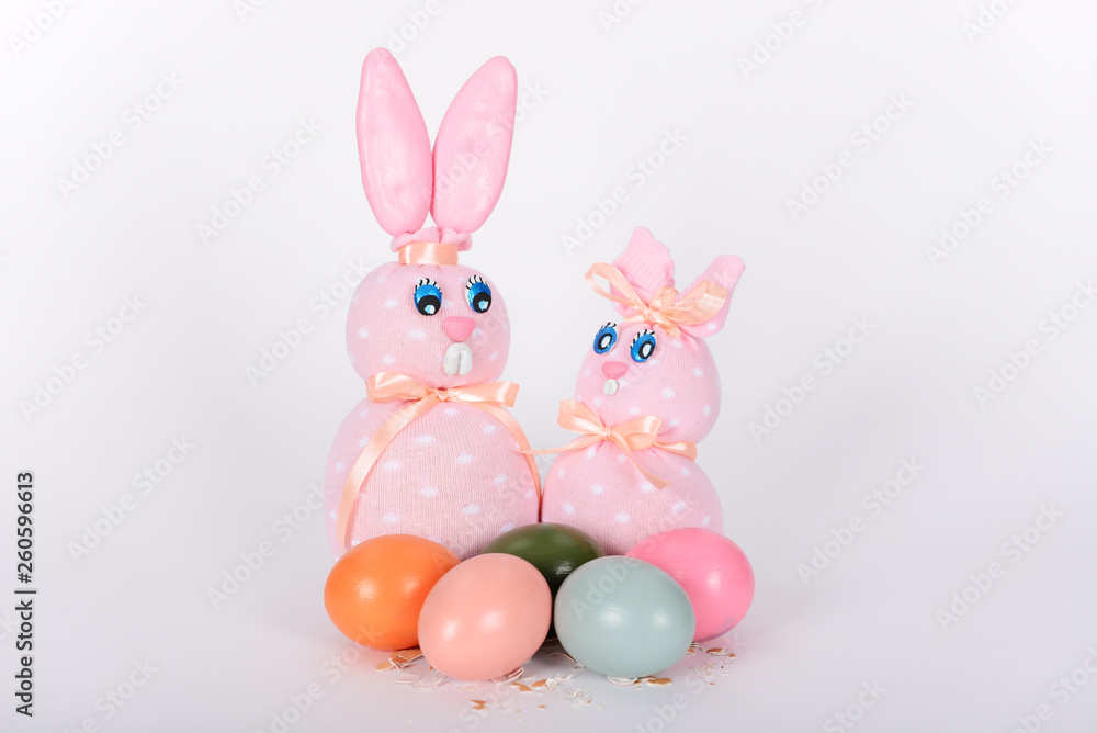 The pink easter male and female hand-made bunnies and easter eggs The pink easter male and female hand-made bunnies and easter eggs