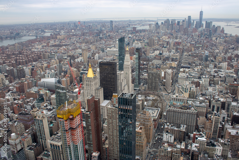 Aerial view of Manhattan in New York City showing the classic high rise buildings and city scape in the USA