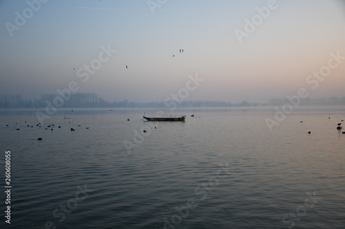 boat in river at sunrise