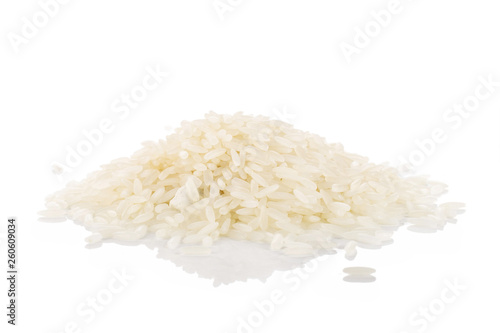 Lot of whole white jasmine rice grains heap isolated on white background