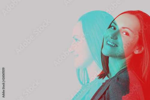 portrait of young brunette woman with effect of double exposure