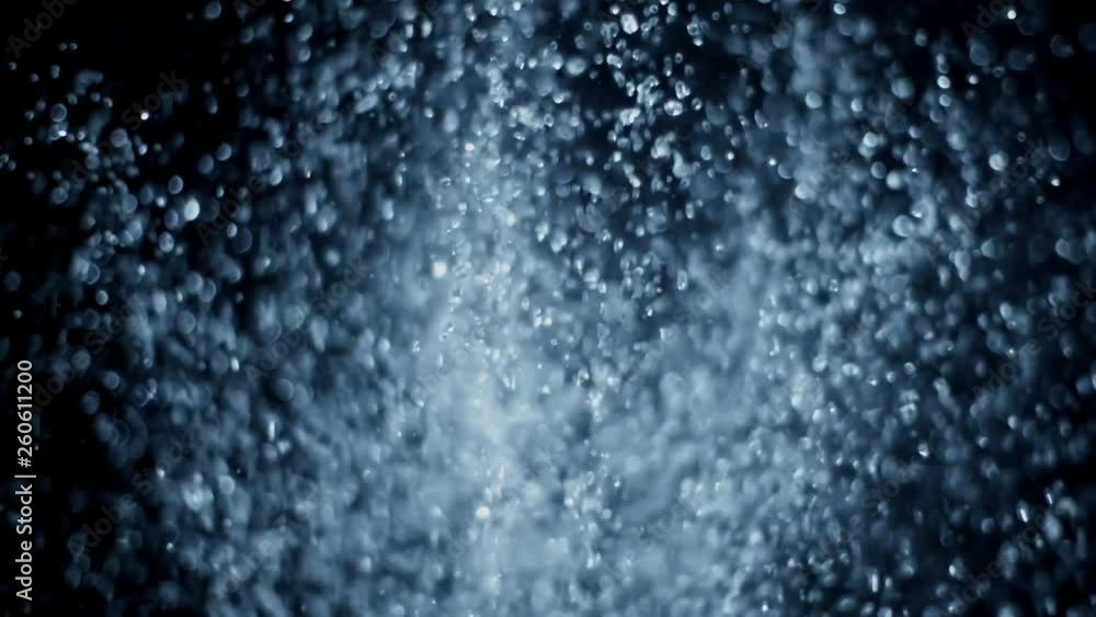 Fountain, fresh blue water splash in slow motion, bouncing clean liquid drops and falling down on black background, rain droplets spraying, abstract Fountain, fresh blue water splash in slow motion, bouncing clean liquid drops and falling down on black background, rain droplets spraying, abstract