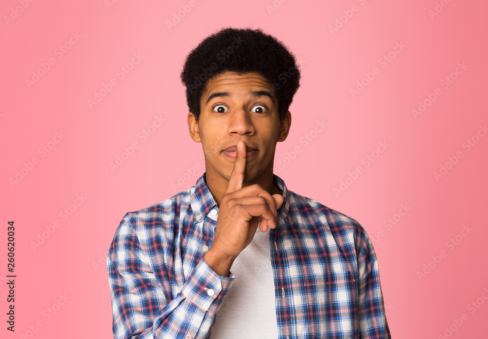 Shh, make silence please. Guy keeping fore finger on lips Shh, make silence please. Guy keeping fore finger on lips