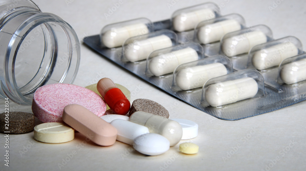 Medicines, supplements and drugs in a bottle.Pharmacy theme, tablets, pills capsule heap mix therapy drugs with medicine antibiotic. Medicines, supplements and drugs in a bottle.Pharmacy theme, tablets, pills capsule heap mix therapy drugs with medicine antibiotic.