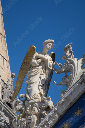 Statue of Saint, detail of the facade of the Saint Mark's Basilica, St. Mark's Square, Venice, Italy,march,2019