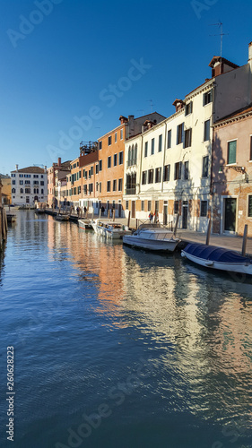 old buildings and boats on canal in Venice, Italy,2019