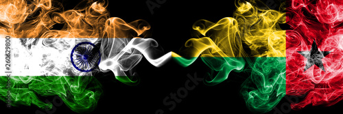 India vs Guinea Bissau smoke flags placed side by side. Thick colored silky smoke flags of Indian and Guinea Bissau