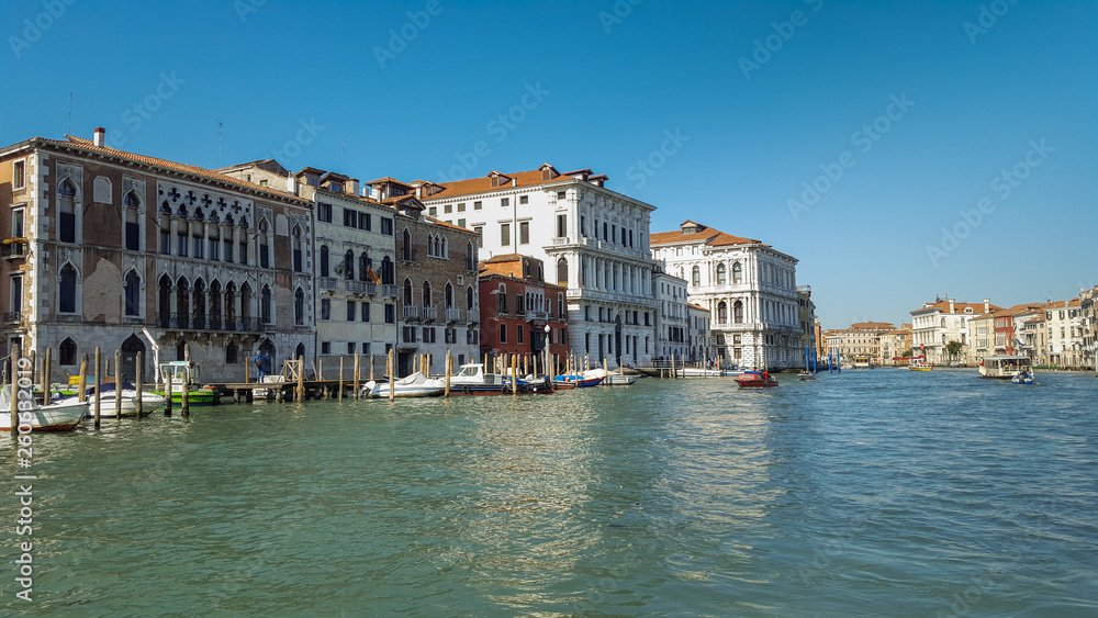 Grand canal with boats and color houses in Venice, Italy,2019