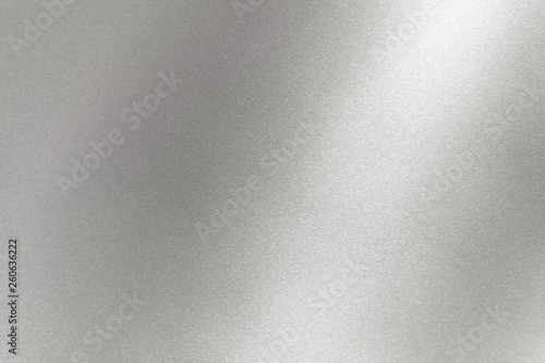 Abstract texture background, light shining on gray metal wall