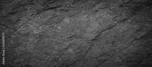 Obraz  z motywem Panorama dark grey black slate background or texture.Panorama black slate background