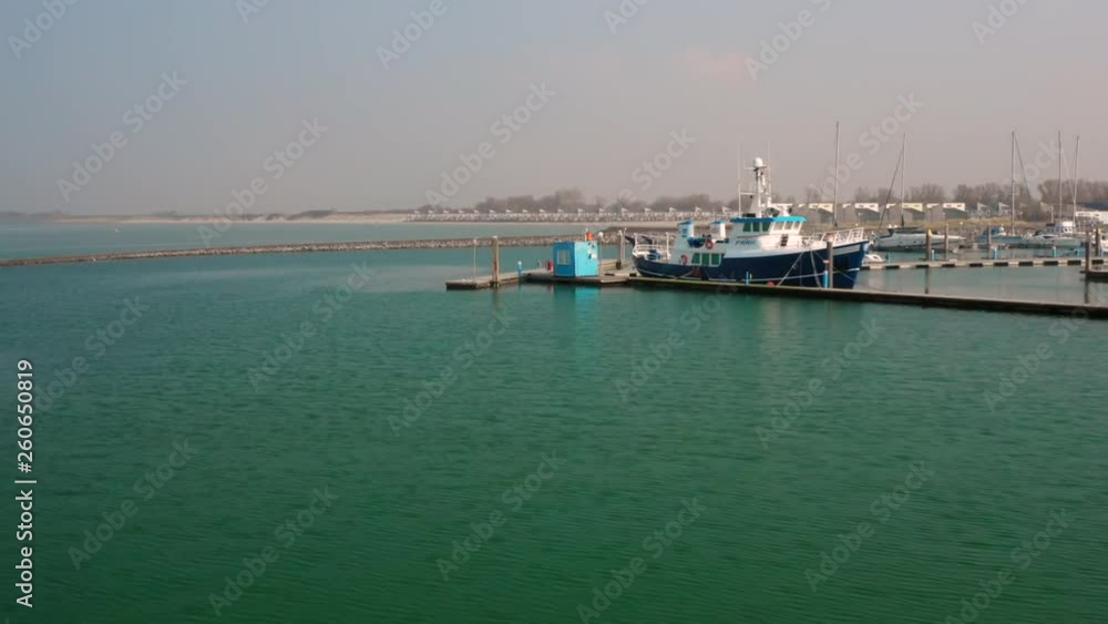 Aerial: Harbour and vacation park during hazy spring day. Aerial: Harbour and vacation park during hazy spring day.