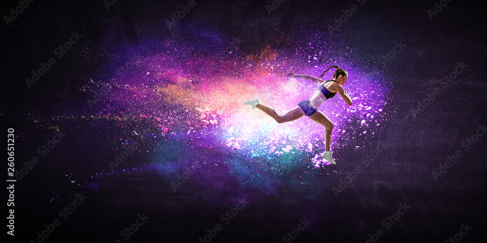 Naklejka premium Fast running young woman. Mixed media