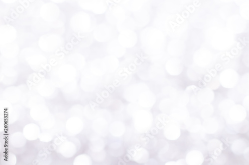 Silver glitter festive background with bokeh lights. Celebration concept for Holidays and anniversary.