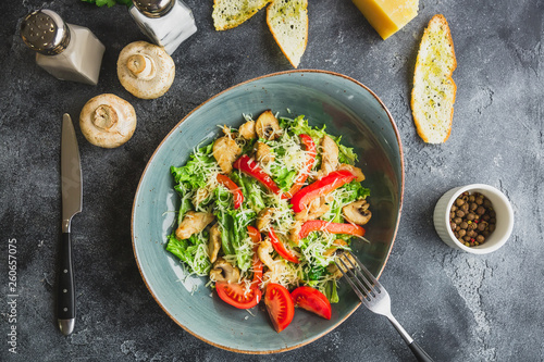 Vegetarian salad with mushroom, cheese in lettuce in a plate photo