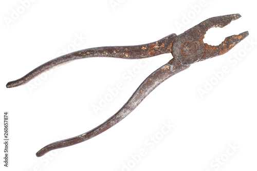 Old rusty pliers are isolated